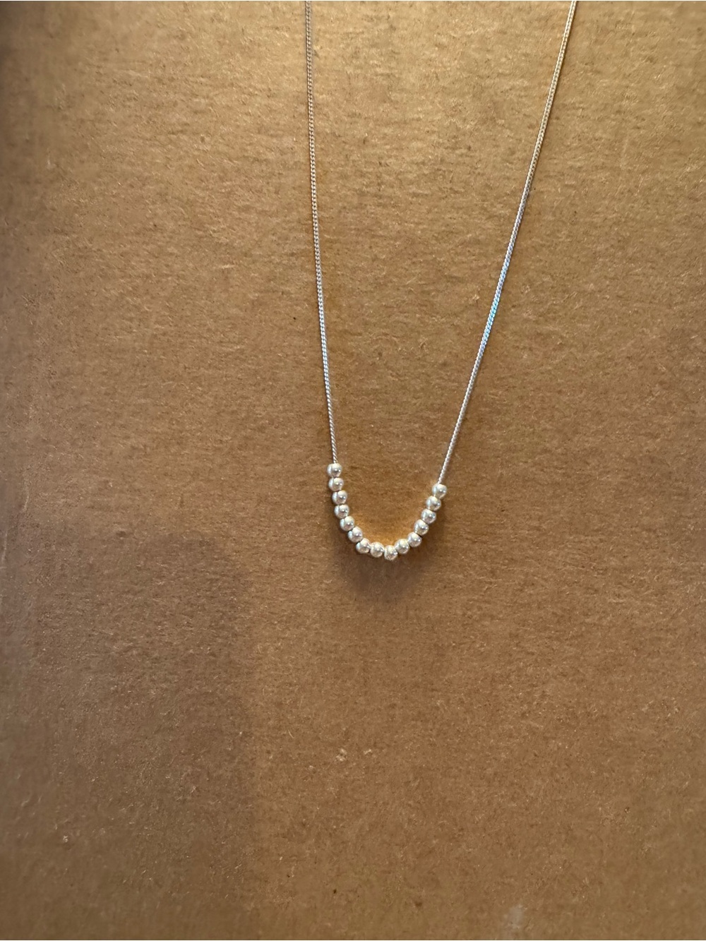 Elegant Silver Beaded Necklace